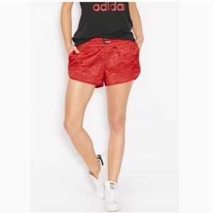 Adidas | red quilted shorts, size M